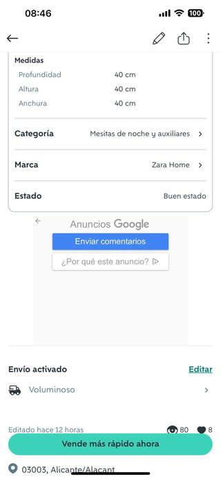 Mesa auxiliar metálica con detalles