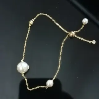 Pendientes y pulsera CH oro blanco