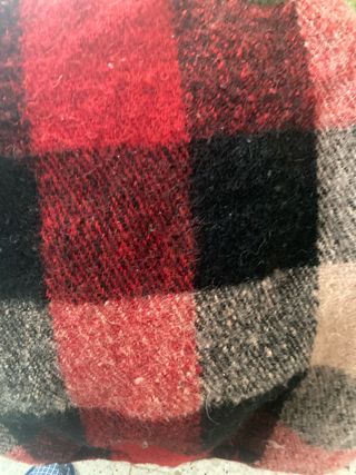 Alfombra de lana tejida a cuadros,