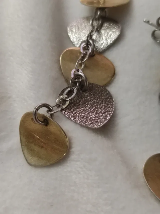 Lote de bijuterias antigas: brincos e relógio