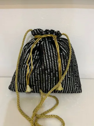 Bolso de fiesta lentejuelas negro y dorado
