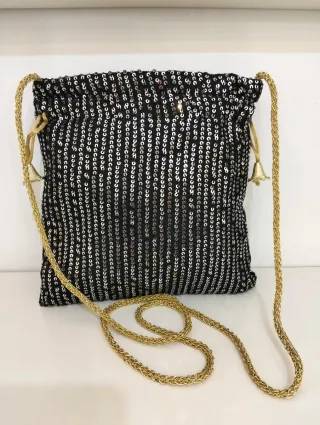 Bolso de fiesta lentejuelas negro y dorado
