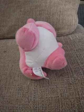 Peluche rosa con estrella amarilla