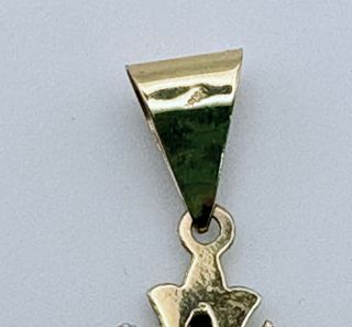 Cruz Oro 18K con Zafiros Negros