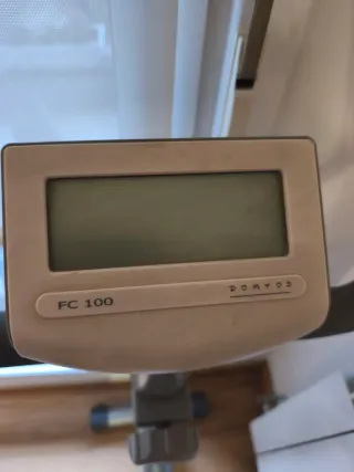 Bicicleta Estática Gris y Blanca