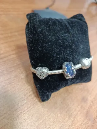 Pulsera Pandora con 2 charms