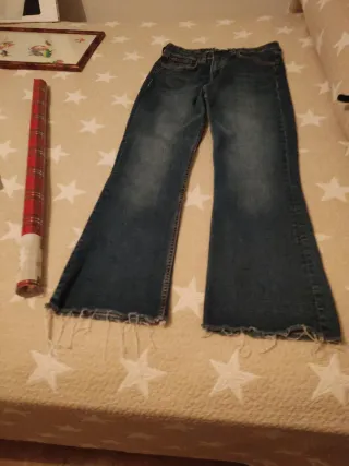 Pantalón vaquero Zara t.38 flecos bajo