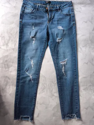 Pantalón vaquero desgastado