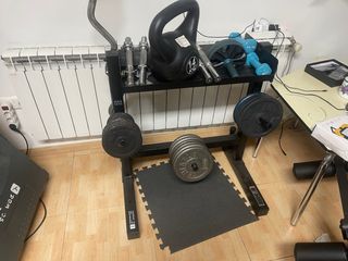 Supporto per barre e dischi da palestra