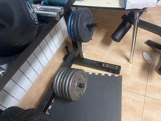 Supporto per barre e dischi da palestra