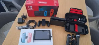 Nintendo Switch + Juegos y Accesorios