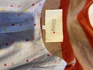 Abrigo Kling rayas beige y naranja