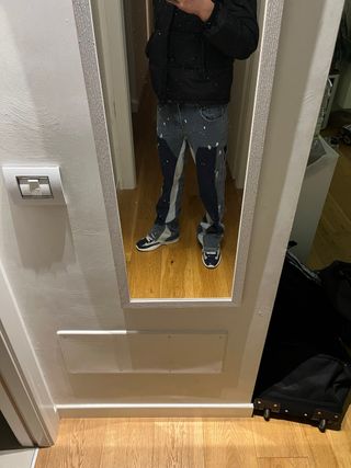 Flared jeans with white paint