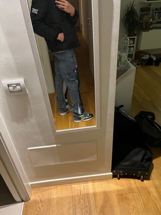 Flared jeans with white paint