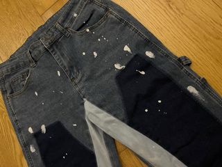 Flared jeans with white paint