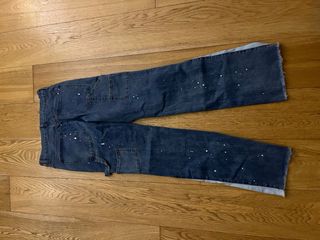 Flared jeans with white paint