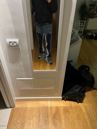 Flared jeans with white paint