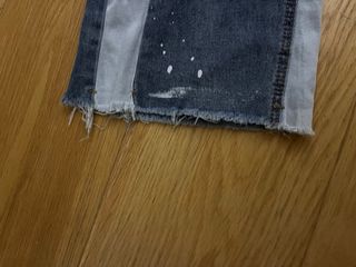 Flared jeans with white paint