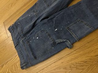 Flared jeans with white paint