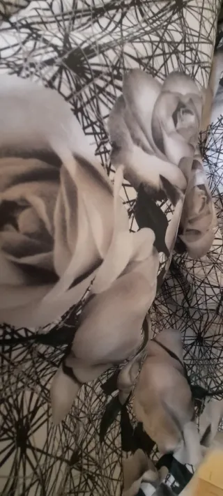 Pellicciotto grigio chiaro con cappuccio