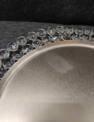 Centro de mesa plateado con pedrería