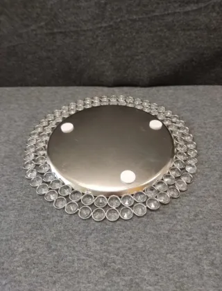 Centro de mesa plateado con pedrería