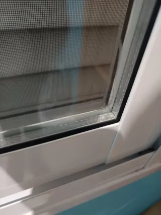 Ventana corredera con mosquitera