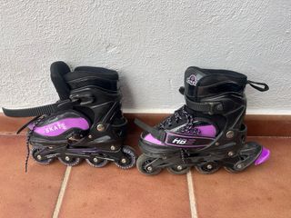 Patines en línea negros y morados