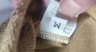 Top fiesta dorado cuello alto