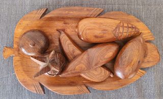 Centrotavola in legno intagliato