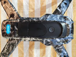 Dron con mando y accesorios