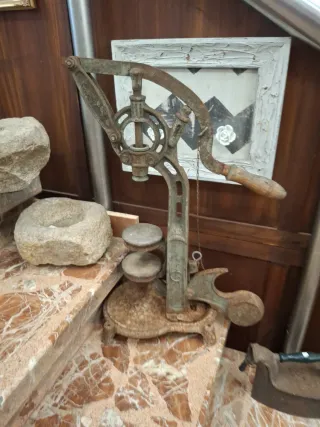 Embotelladora antigua de hierro fundido