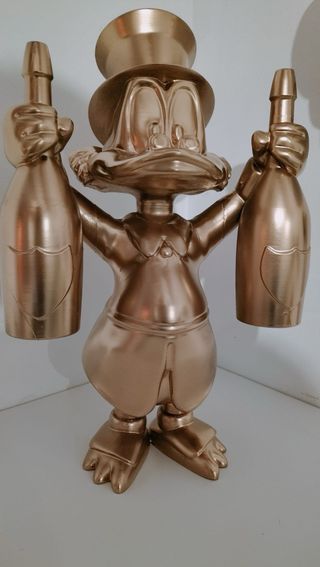 Mc Duck Oro con Bottiglie Dom Perignon