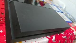 PS4 con 9 juegos y mando azul