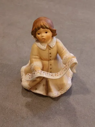 Statuina angelo porcellana