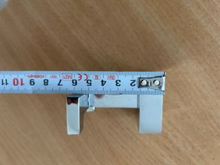 Colgador de pared metálico plateado