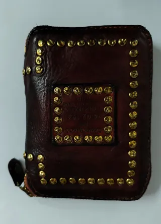 Cartera Campomaggi color vino con Tachuelas