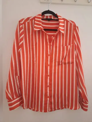 Blusa roja manga larga