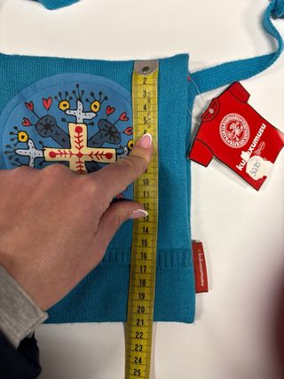 2 Bolsos Kukuxumusu,pequeño y grande y Reloj Radio