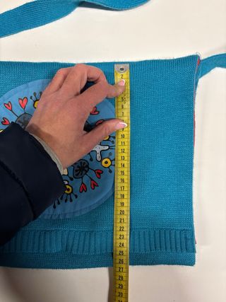 2 Bolsos Kukuxumusu,pequeño y grande y Reloj Radio