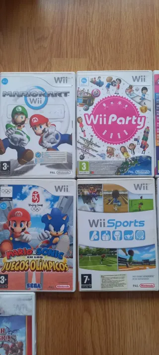 Nintendo Wii Negra con 9 juegos, Sports, Mario etc