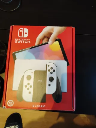 Nintendo Switch OLED Bianca + Pokémon + Accessori