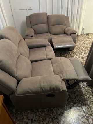 2 sofás de tela beige y marrón