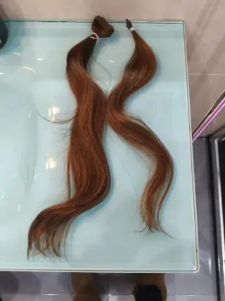 Extensiones de cabello castaño rojizo