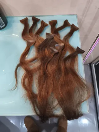 Extensiones de cabello castaño rojizo