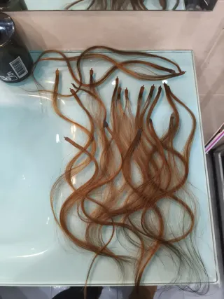Extensiones de cabello castaño rojizo