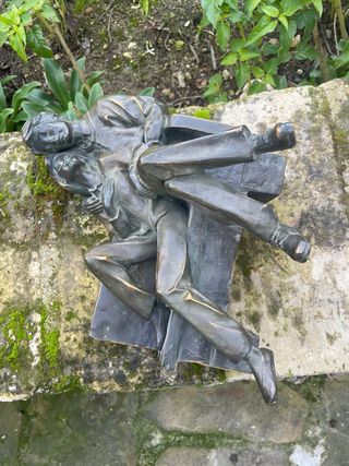 Figura Exaloc de pareja sentada