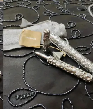 Set 2 penne argentate con strass Coin