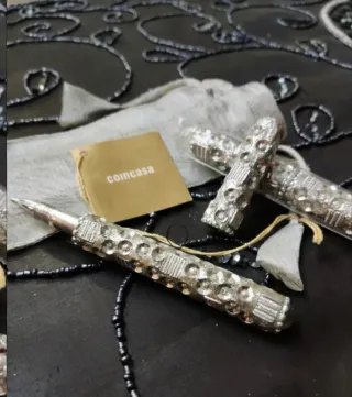 Set 2 penne argentate con strass Coin