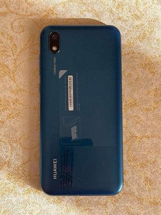 Huawei Y5 2019 con scatola, caricatore e custodia